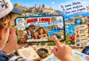Dziecko trzyma poziomo telefon z wyświetloną okładką komiksu „Malta i Gozo – Małe wyspy – wielkie przygody”, a drugą ręką wskazuje ekran. W tle widok Malty z morzem, zabytkowym miastem i skalnym łukiem; obok telefonu widoczne są mapa, kompas i drewniana tablica z hasłami „Komiks”, „Prawdziwe miejsca”, „Zagadki”, „Ciekawostki”, „Dla całej rodziny”.